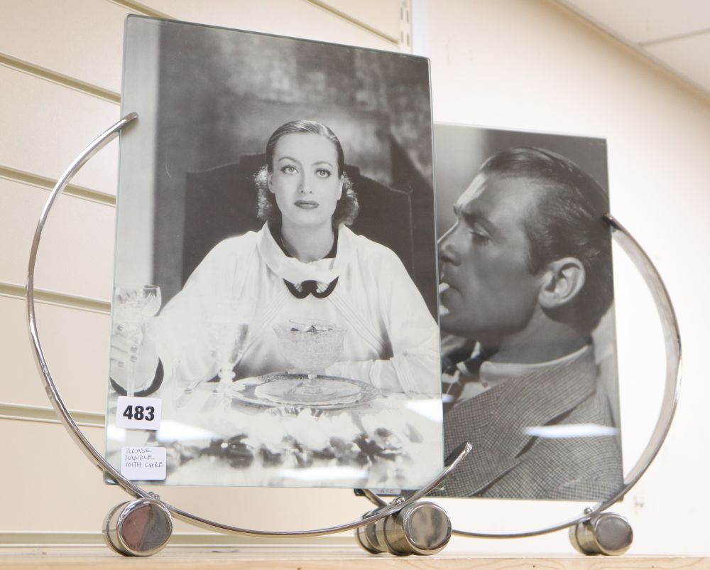 A pair of large 1930s-50s chrome and glass semi-circular photograph frames